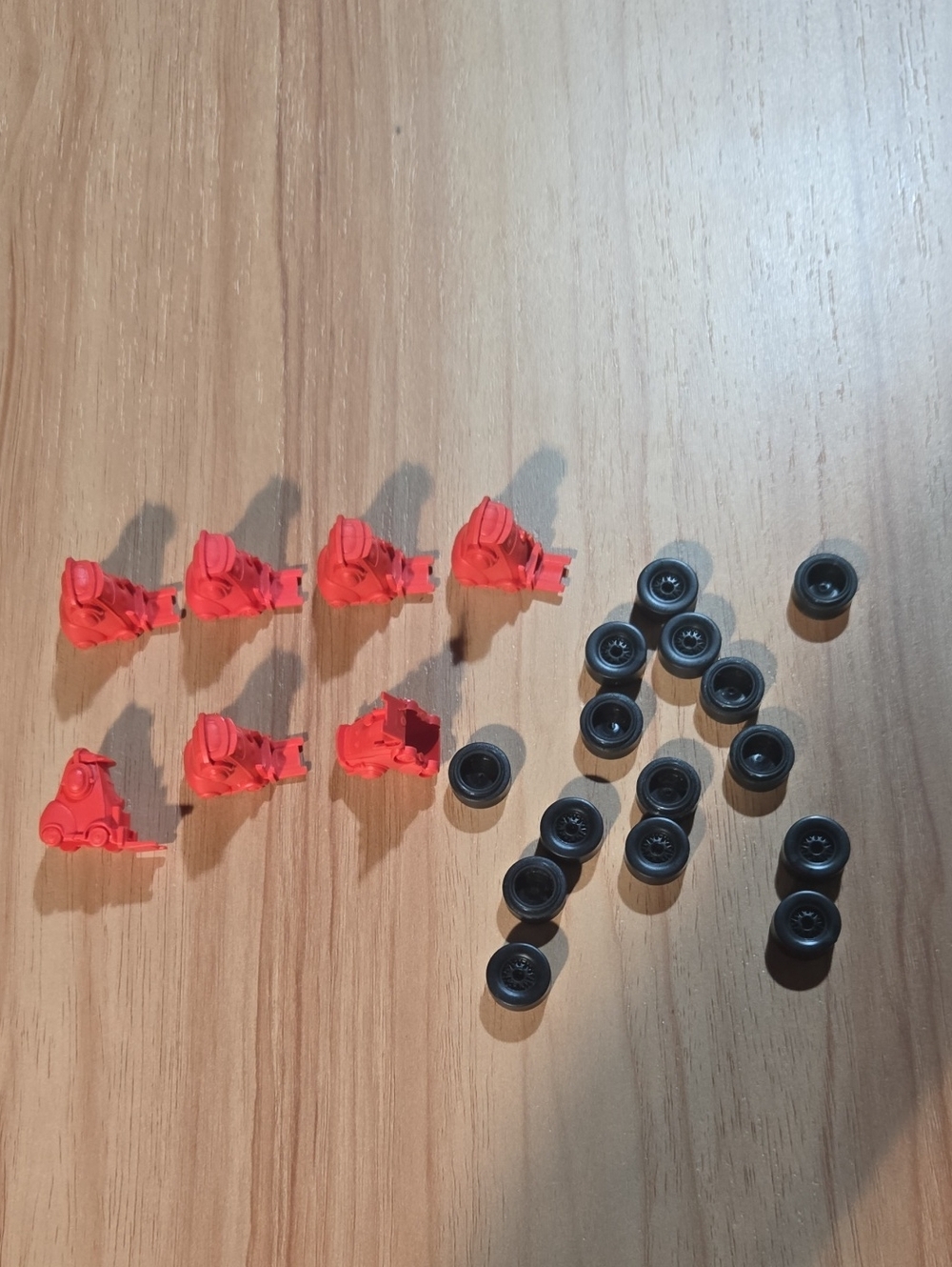 Red Plastic *Cars* Game Pieces with Small Black Wheels - Lot